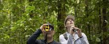 Members of the AfriSAR team, Sassan Saatchi (left) from NASA's Jet Propulsion Laboratory and Laura Duncanson (right) from NASA's Goddard Space Flight Center take measurements of trees in the rainforest in the Mondah National Park, Gabon. CREDIT: NASA/Carla Thomas.